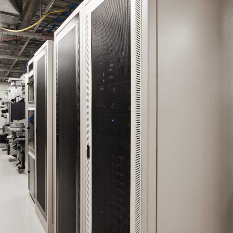 Computer servers in cabinet.