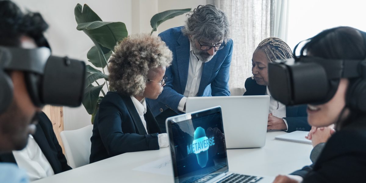 Multiracial business people using virtual reality goggles work inside metaverse cyberspace - VR lifestyle technology concept - Focus on senior man face